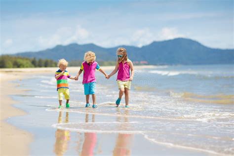 Kids On Tropical Beach Children Playing At Sea Stock Photo Image Of