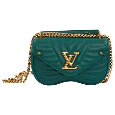 Famed french fashion house launches a new handbag collection with two styles and several colors that is equal parts elegant and youthful, called new wave. Louis Vuitton New Wave Green Leather Handbag in Green - Lyst