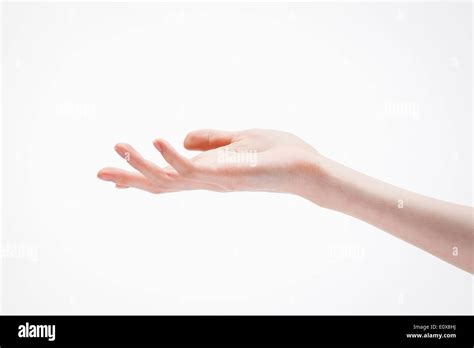 A Woman Holding Her Hand Palm Up Stock Photo Alamy