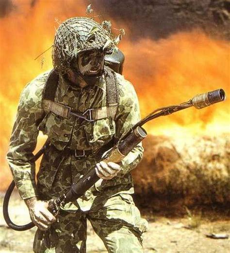 Us Army Paratrooper With The M1942 Camo Uniform Using A Flamethrower