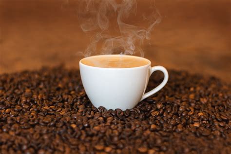Steaming Cup Of Hot Coffee 4k Ultra Hd Wallpaper Background Image