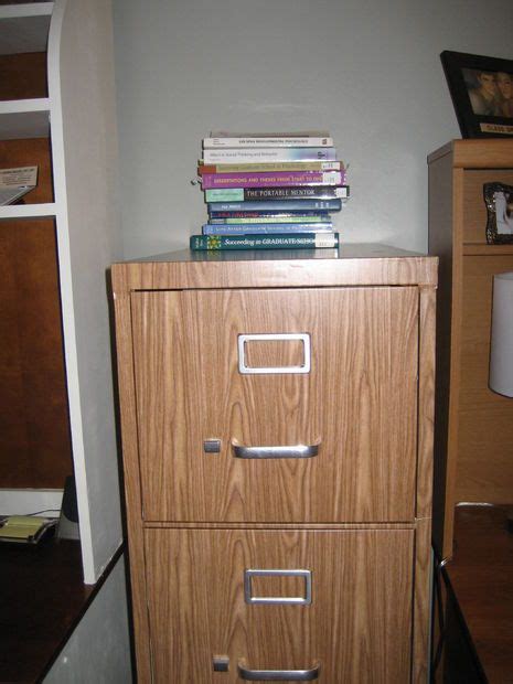 Metal file cabinet makeover, an amazing metal file cabinet transformation done by barbara from chase the star. File Cabinet Makeover: How to Cover a File Cabinet With ...