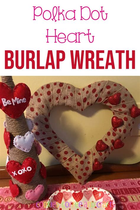 A Heart Shaped Burlap Wreath Sitting On Top Of A Table