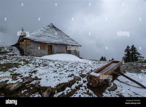 Chalet In Switzerland Alps Mountains In Winter Fog Stock Photo Alamy