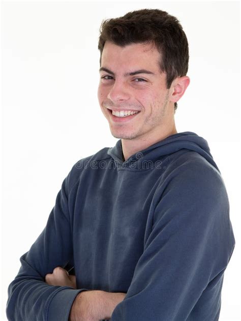 Portrait Of Handsome Smiling Young Man With Folded Arms Crossed