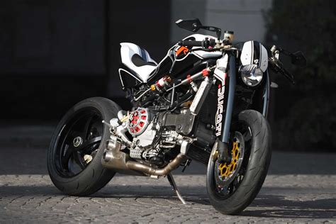 For those who are looking for a ducati cafe racer kit without actually chopping off the bits, there are a couple of options for you too. Tex Design Ducati Monster S4R | Return of the Cafe Racers