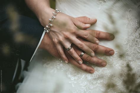 Detail Of Caressingly Bridal Couple Hands With Wedding Rings Del