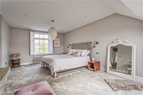 The master suite in this home has what every king and queen would be looking for. Loft Master Bedroom In South West London - Laura Butler-Madden