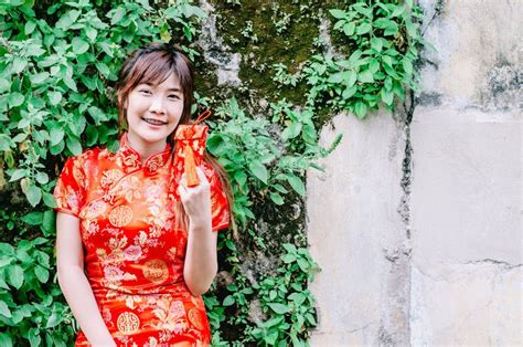 Portrait Charming Beautiful Asian Woman Wear Cheongsam Dress Gets Red
