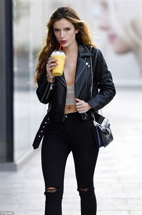 Bella Thorne Dons A Lace Crop Top And Studded Leather Jacket In La