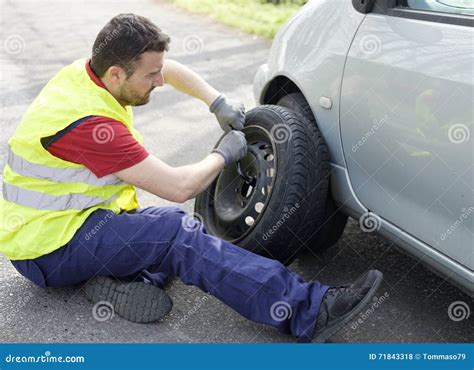 Man Fixing Flat Tire Stock Photo Image Of Breakdown