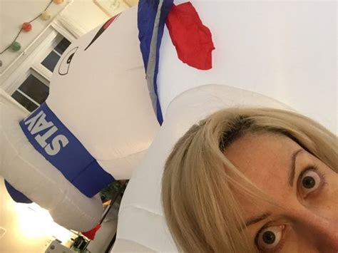 woman inflates giant stay puft marshmallow man in the wrong room 4 pics