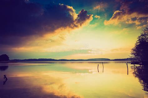 Vintage Photo Of Sunset Over Calm Lake Stock Photo Image Of Dusk