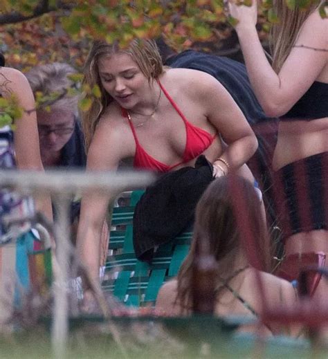Chloe Moretz Takes Zac Efron S Lead And Strips Down To Her Swimwear On