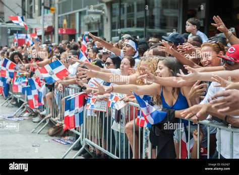 thousands of dominican americans and their friends and supporters march and view the 33rd annual