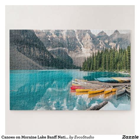 Canoes On Moraine Lake Banff National Park Canada Jigsaw Puzzle