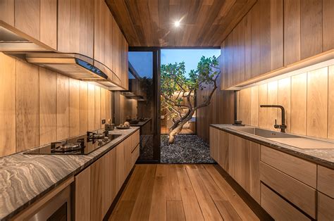 Warchitect Built A Borderless Wooden Residence On Rooftop In Bangkok