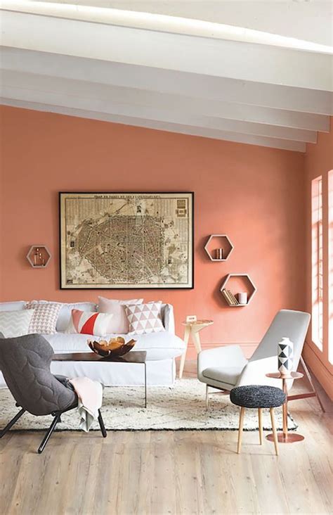 A Stylish Contemporary Living Room With A Coral Statement Wall Light