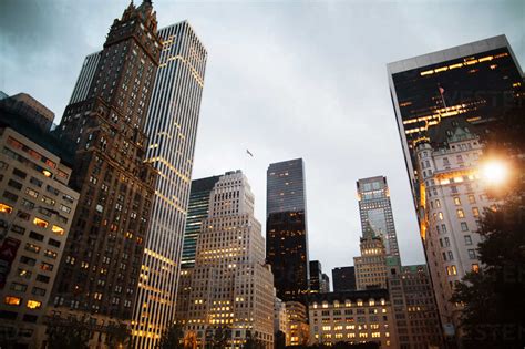 Low Angle View Of Illuminated Modern Buildings Against Sky Stock Photo