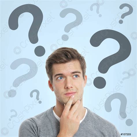 Young Man With Question Marks Stock Photo Crushpixel