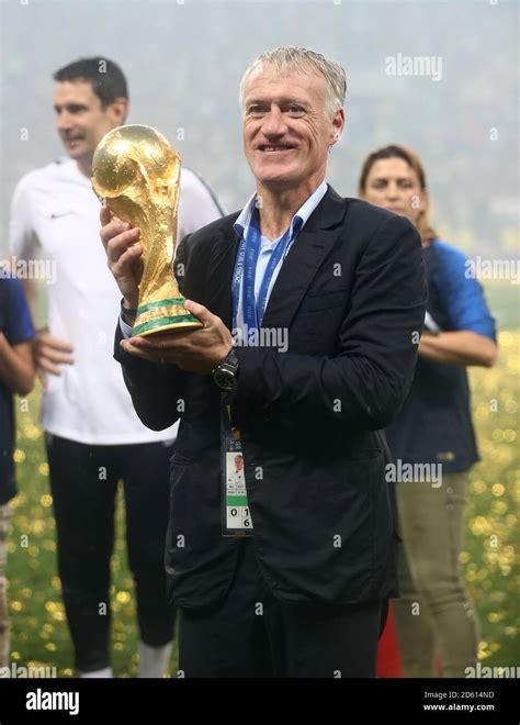 France Manager Didier Deschamps Celebrates With The Trophy After The