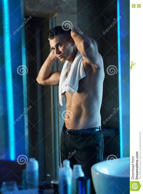 Men Hair Care Man Touching His Hair In Bathroom Men Grooming Stock Image Image Of Middle