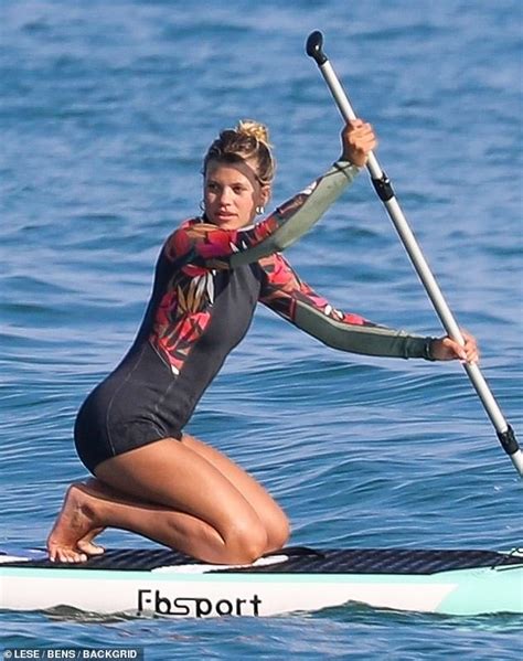 Sofia Richie Puts Her Curves On Display In A Wetsuit As She Paddle Boards With Friends In Malibu