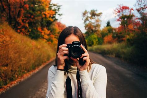Free Download Hd Wallpaper Photo Of Woman Holding Camera Canon