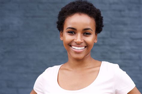 Attractive Young Black Woman Smiling Miles To 40