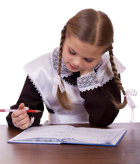 Young Beautiful Schoolgirl Sitting At A Desk Stock Photo Image Of
