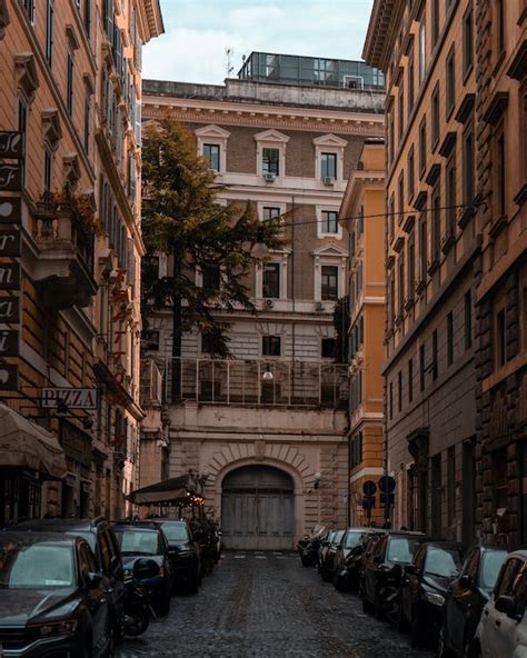 Cars Parked In Narrow Alley · Free Stock Photo