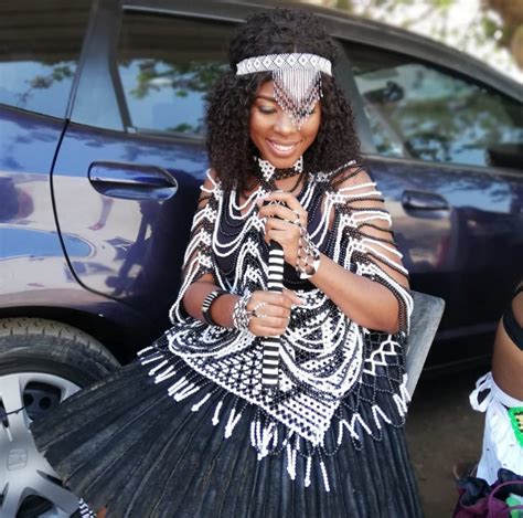 clipkulture zulu girl in black and white beaded traditional attire for umemulo