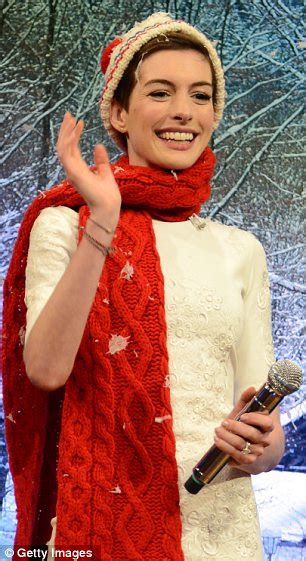 Jingle Belle Anne Hathaway Shows Her Christmas Spirit As She Slips On
