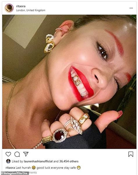 Rita Ora Puts On A Quirky Display As She Flashes Gold R Teeth Grills