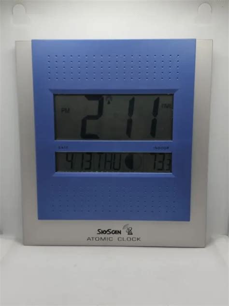 Skyscan Atomic Clock 86715 Silver Blue Desk Wall Mount Date Temperature