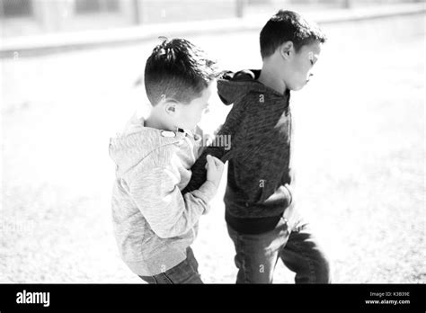 Two Boys Fighting In Playground Stock Photo Alamy