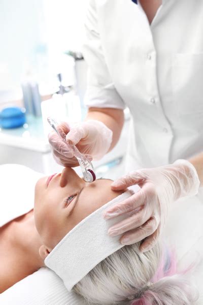 The Beautician Performs A Needle Mesotherapy Treatment Royalty Free