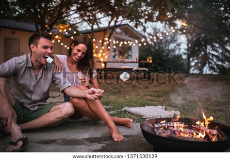 Lovely Couple Roasting Marshmallows Backyard Stock Photo 1371530129