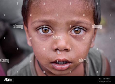 Curiously Looking Indian Boy With Big Eyes And Sad Faceindian Village