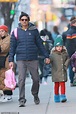 Bradley Cooper is every inch the doting dad as he holds hands with ...