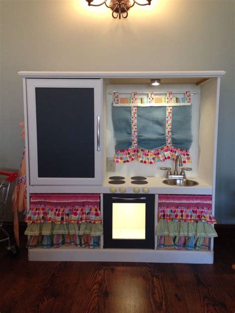 The color is fun.the nice countertop space… and the stainless steel appliances are so cute! Pin by Lindsey Miller on Kids Kitchens | Old entertainment centers, Childrens play kitchen, Diy ...