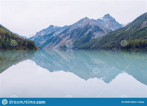 Beautiful Blue Kucherla Lake Reflection Of Mountains In The Water