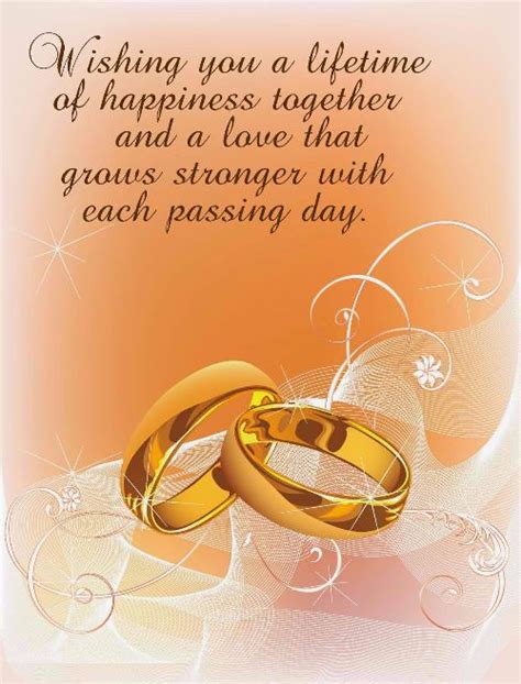 Two Gold Wedding Rings With The Words Wishing You A Lifetime Of