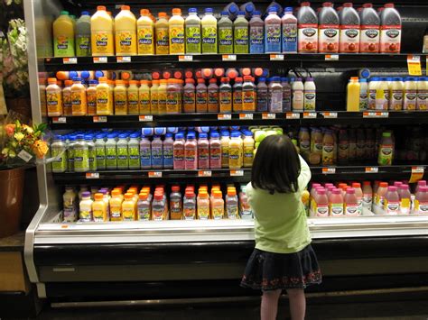Choose Wisely Little Girl Checks Out Juices At Whole Food Flickr