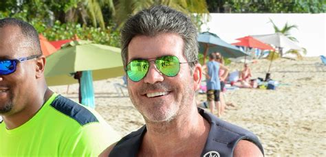shirtless simon cowell soaks up the sun in barbados lauren silverman shirtless simon cowell