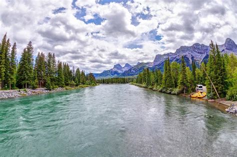 Bow River In The Town Of Canmore On The Banff Range Of The Canadian