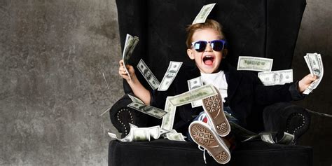 Happy Rich Kid Boy Millionaire Sits Under Money Rain Bills Falli
