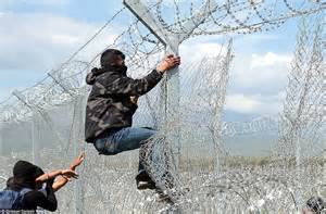Migrants Trying To Break Through Fence At Greece S Border With