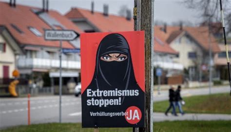 Swiss Voters Narrowly Back Burqa Ban