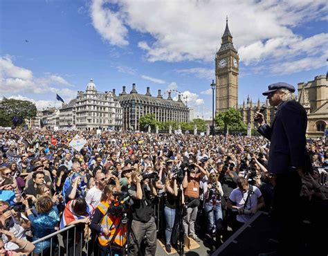 bob geldof addresses thousands of protesters in parliament square as they take part in a march
